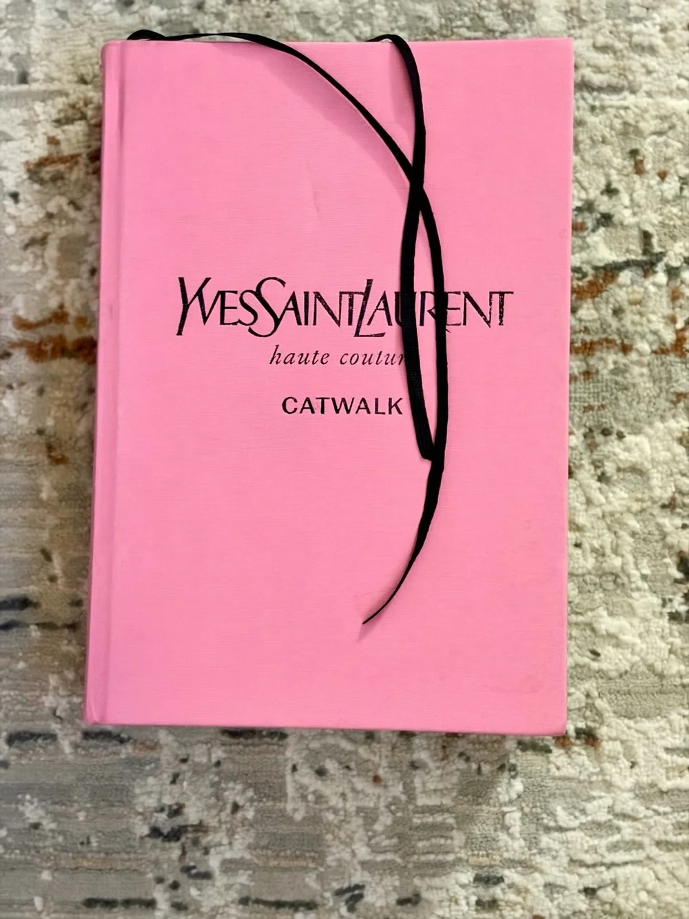 Yves Saint Laurent Pink Hardcover Haute Couture Book.
